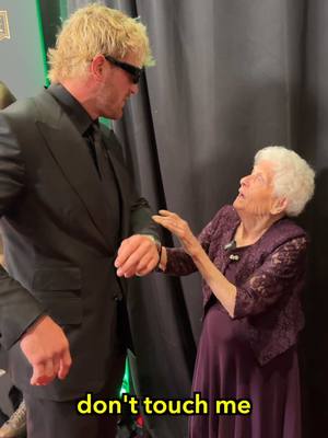 A post by @rosssmith on TikTok caption: Granny messes with WWE Superstars 😂 @Logan Paul @randyorton @Triple H @MikeTheMiz @Jey Uso @Maryse Mizanin #WWE  