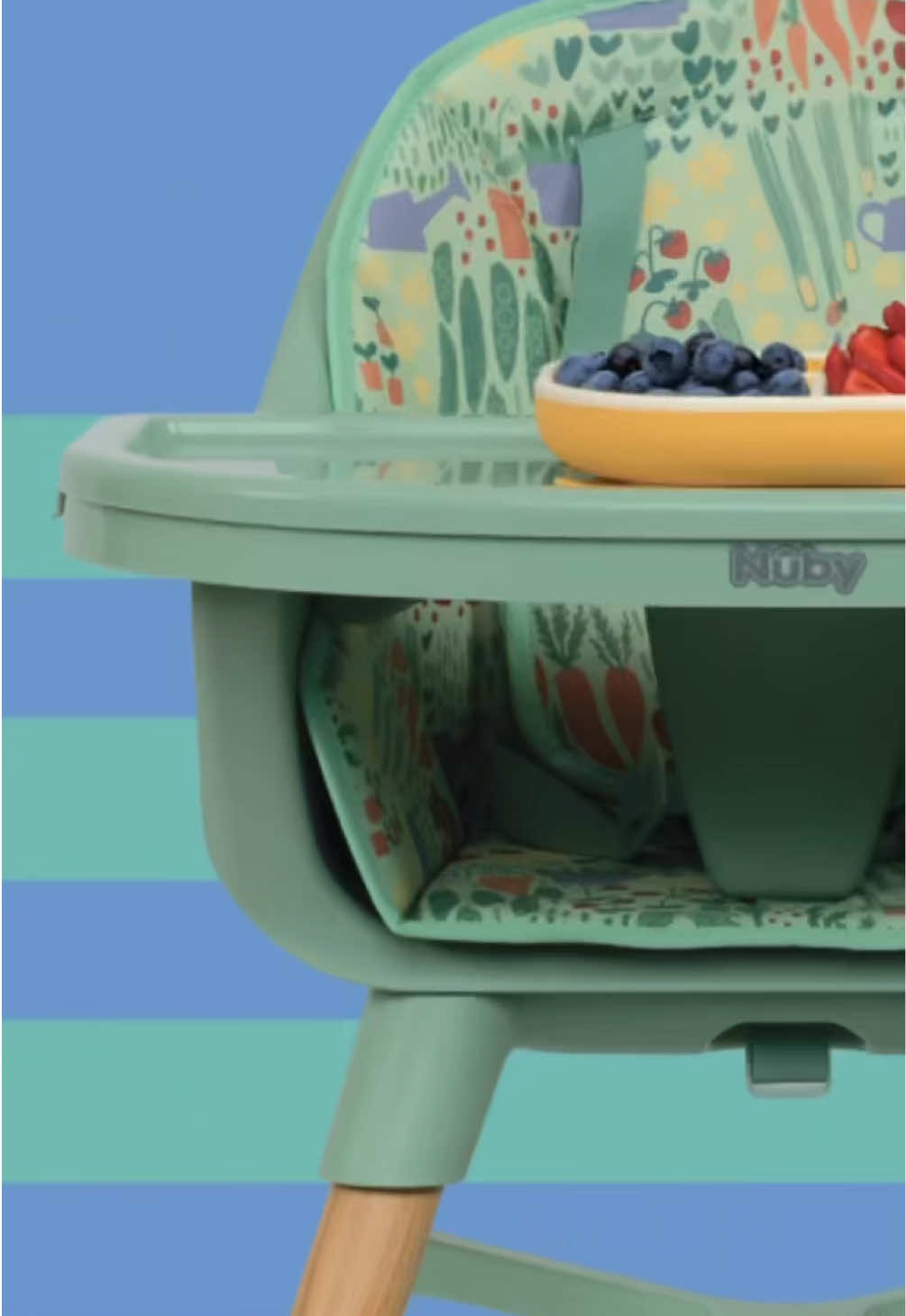 A post by @nuby on TikTok caption: Sip, eat, lounge, relax - our new 4-in-1 high chair does it all 😋🫐🧃  Get $30 off with code MEALTIME30 for a limited time! 🏃‍♀️ #nubyusa #parenting #toddleractivities #highchairbaby 