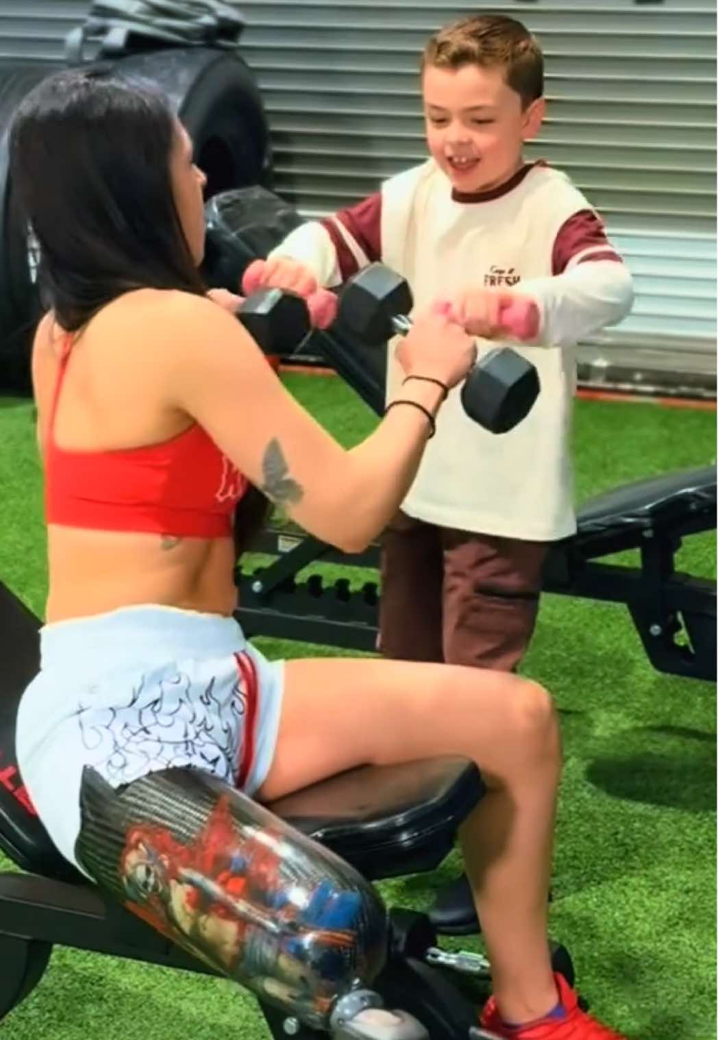A post by @thefitglamputee on TikTok caption: The best workout partner 🥹.                   @Kill Crew 🤍♥️