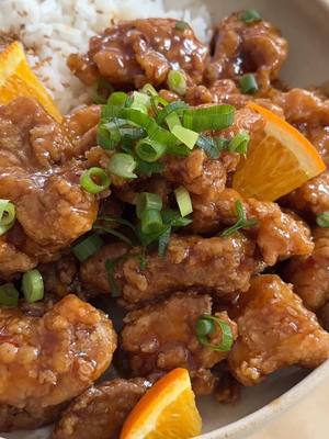 A post by @moribyan on TikTok caption: Panda Express Orange Chicken at home, even better, and gluten free 🍊🍚 full recipe up on the blog as always - link in bio!