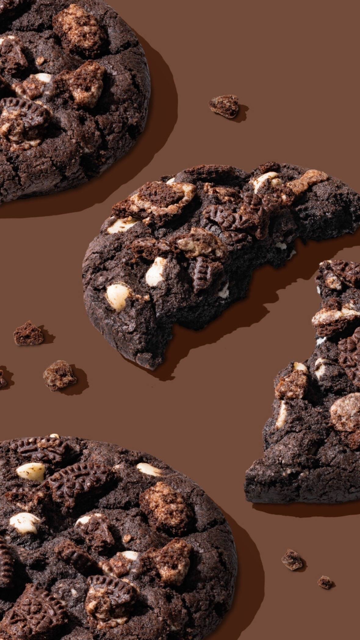 A post by @crumbl on TikTok caption: And let me just say this... when it comes to cookies & cream flavored anything... imma have it. Chocolate Cookies & Cream Cookie is back! 🤎🤍  Rate this cookie👇 #Crumbl