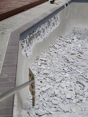 A post by @ultrapools on TikTok caption: Crazy how Discount Dave hooks you with a cheap price but doesn’t mention his plaster won’t last… Buy once, cry once. Our Ultra Pebble finish is built to last decades — not just a couple of swim seasons. 💦 Quality > corners cut. 💦 Ready when you are.