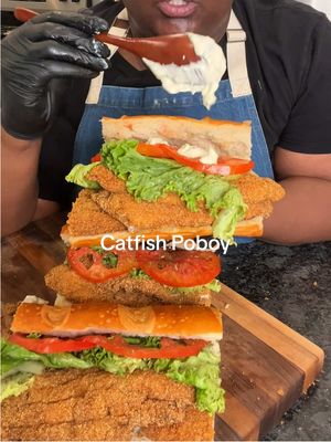 A post by @its_sogood on TikTok caption: Catfish Poboy.                                            8 small catfish fillets 2 eggs  2-3 tsp Old Bay Seasoning  Cornmeal batter: 1 1/4 cups fine yellow cornmeal  1 tbs garlic powder  1 tbs baking powder  2 tsp smoked paprika  2 tsp cayenne pepper  2 tsp onion powder  2 tsp kosher salt Black pepper  Sauce: 1 cup mayo 1/4 cup sour cream  1 bulb roasted garlic  1 sm shallot Chives Fresh Dilll weed Sweet relish  1.5 tbs Dijon mustard  1-2 tsp Ranch dip seasoning (optional) Other:  1 large French roll Lettuce  Heirloom tomatoes (lightly season) Oil for frying (I used peanut oil) #food #EasyRecipes #fyp #tiktokfood #homemade 
