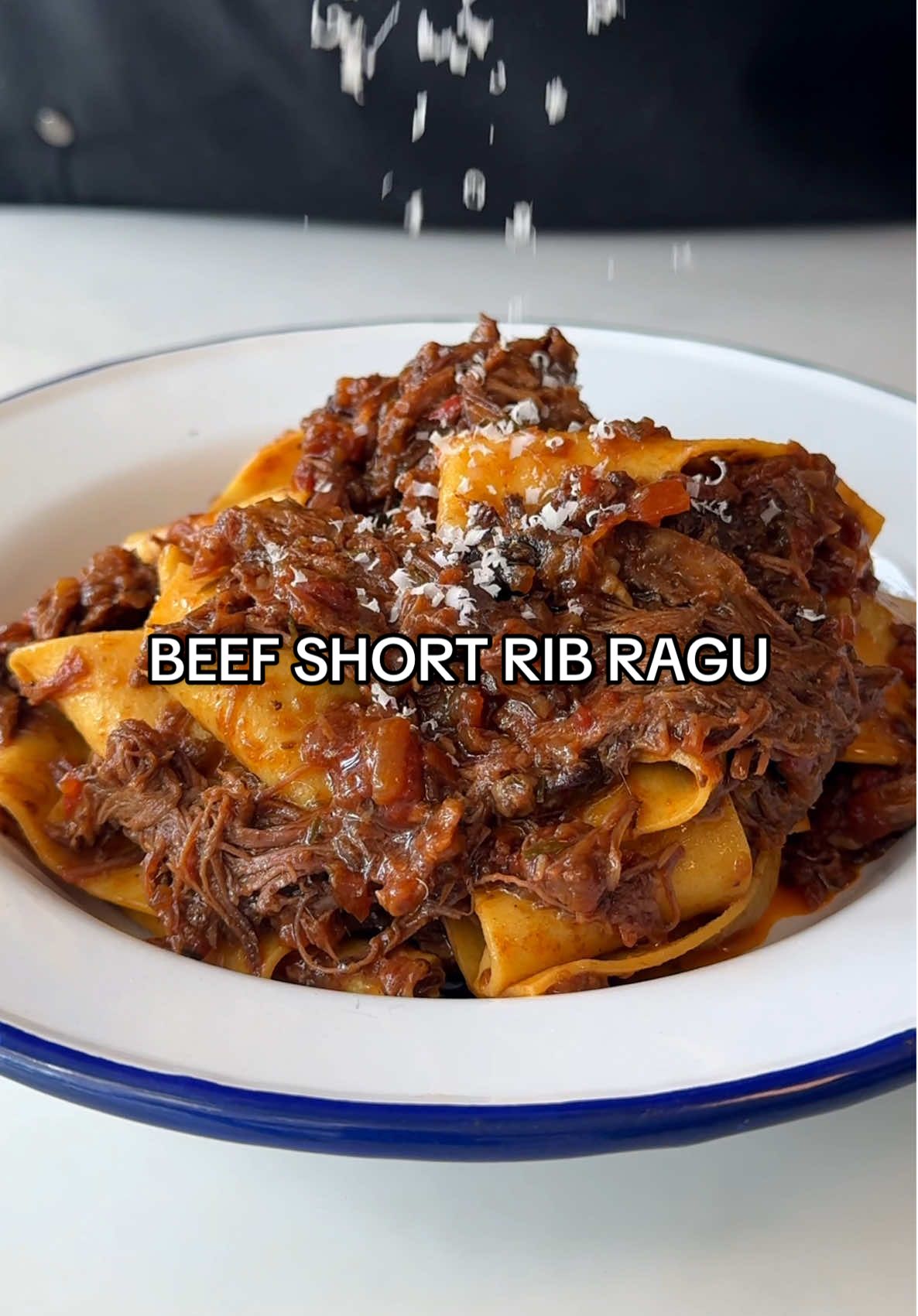 A post by @samseats on TikTok caption: Beef Short Rib Ragu 🥩 Full recipe now up on Substack - link in bio! ❤️🔥 #pasta #ragu #datenight #comfortfood #easyrecipes #ragu #ribs #recipe #asmr 