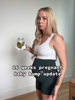 A post by @kayandtayofficial on TikTok caption: Was Ellie talking to a ghost! 😳😅 backstory ::: Kay was getting ready to go downstairs and workout, and when I walked in a realized how big her bump has gotten! Her belly is getting large much quicker than with ellie! I think that though it’s big, it’s such a perfectly round belly! We chatted about how big bug was getting, and then Ellie started to wake up. She started talking and saying hi to the ceiling. And was even waving at the ceiling! 😳 I joked that she must have been talking to ghosts and kay did not like that! 😂 We decided to just go get Ellie and skip the workout for today! #kayandtayofficial #couples #relationships #pregnant #postpartum 