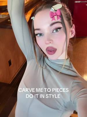 A post by @dovecameron on TikTok caption: idk where i am !!! ONE WEEK TIL FRENCH GIRLS 🎧🪽🎨🩰🖼️🗽🎠