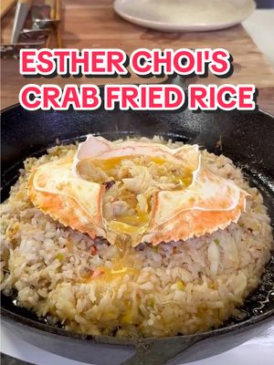 A post by @foodnetwork on TikTok caption: crab fried rice with a crispy rice bottom and decadent crab butter is a favorite at @esther choi's restaurants for a REASON 😍 #24in24