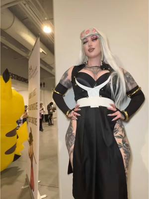 A post by @ravengriim on TikTok caption: #onthisday ahh I miss cosplaying Tengen!! Should I bring it back? #uzuitengen #tengencosplay #tengenuzui #demonslayer #animetiktok 
