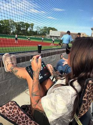 A post by @britttareco on TikTok caption: On scoreboard duty tonight? #fishwithbrit #brittanytareco #fyp 