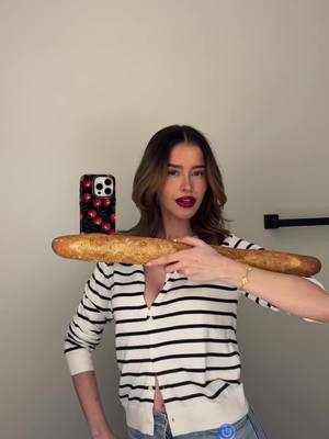 A post by @leaelui on TikTok caption: Guess where I’m from 😂🥖