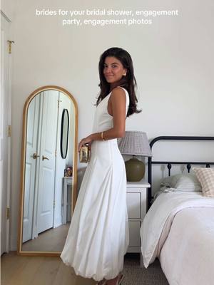A post by @vivianeaudi on TikTok caption: elegant & classy ✨ #bridesoftiktok #bridaldress #whitedresses #whitedress #whitedress #bridalshowerparty #engagementphotoshoot #engagementphotos #bridedress #summerdress 