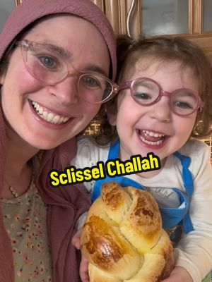 A post by @miriamezagui on TikTok caption: Come make Shlissel challah with me and Dassy. The key is symbolic of unlocking wealth and good fortune. #challah #baking #toddler #shlisselchallah #jewish