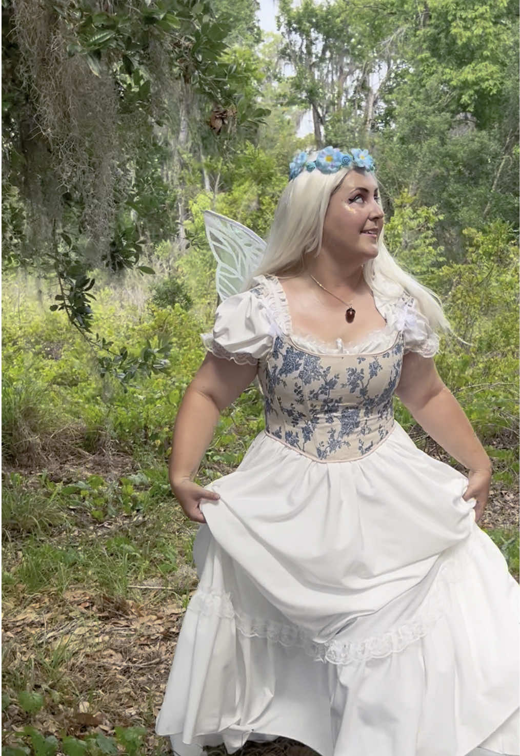 A post by @thedisneybelle on TikTok caption: Life’s too short to not be a fairy in the woods with friends 🧚🏻 #fairy #fairycore #fairies @Dana Isabella @Meggy @Sara Saunders @Angela Moran 