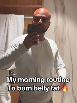 A post by @ravmalik on TikTok caption: Easiest morning routine to burn belly fat 