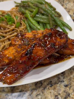 A post by @yo_thats_erica on TikTok caption: Teriyaki Salmon & Garlic Noodles 😋 😩😋#thatmanandthemkids #easymeal #momlife #easydinnerideas