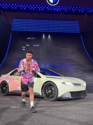A post by @youneszarou on TikTok caption: Human vs. Car Gravity has a new rival  #BMW #HEARTOFJOY #BMWVISIONDRIVINGEXPERIENCE #NEUEKLASSE @bmw #yzfamily 