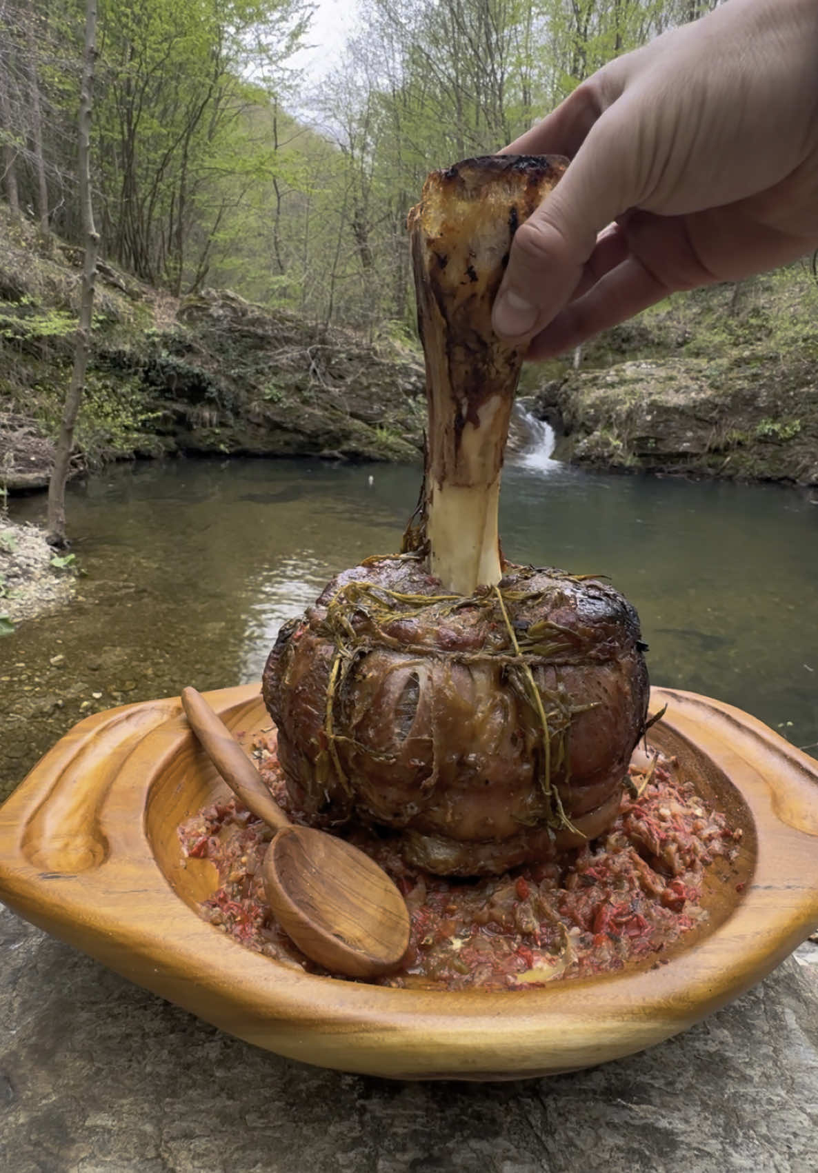 A post by @karadenizli.maceraci on TikTok caption: Çamurda İlikli Dana İncik Pişirme 🍖 Cooking Beef Shank with Marrow in Mud  #outdoorcooking #outdoors #foodvideos #cooking #asmr #asmrvideo #asmrcooking #foodporn #camping #cookingoutdoors #recipe #yemektarifleri 