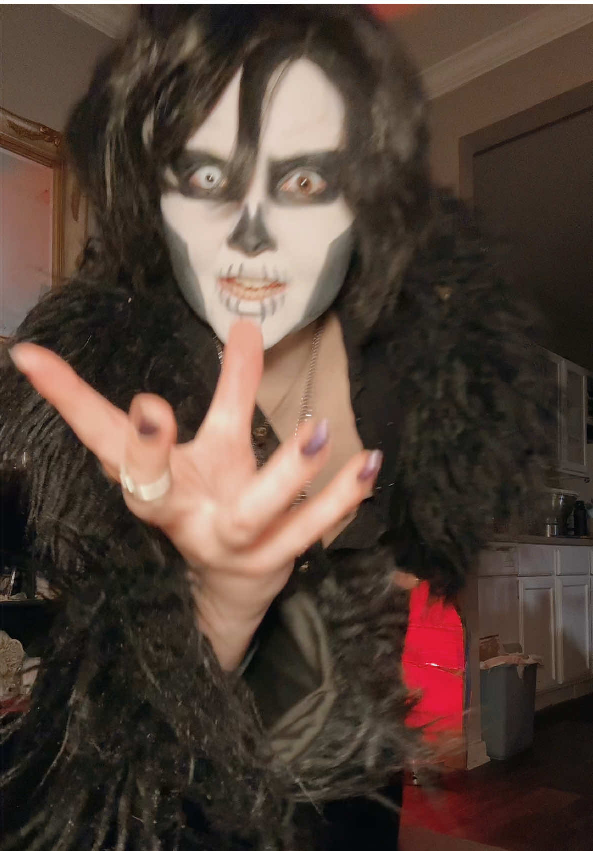 A post by @galacticstitch_cosplay on TikTok caption: SOOOO what’s everyone favorite song from #skeleta so far?? Mine has to be Umbra. We went to the midnight album release and it was so much fun being there as Nihil 🖤 #ghost #papanihil #ghostband 