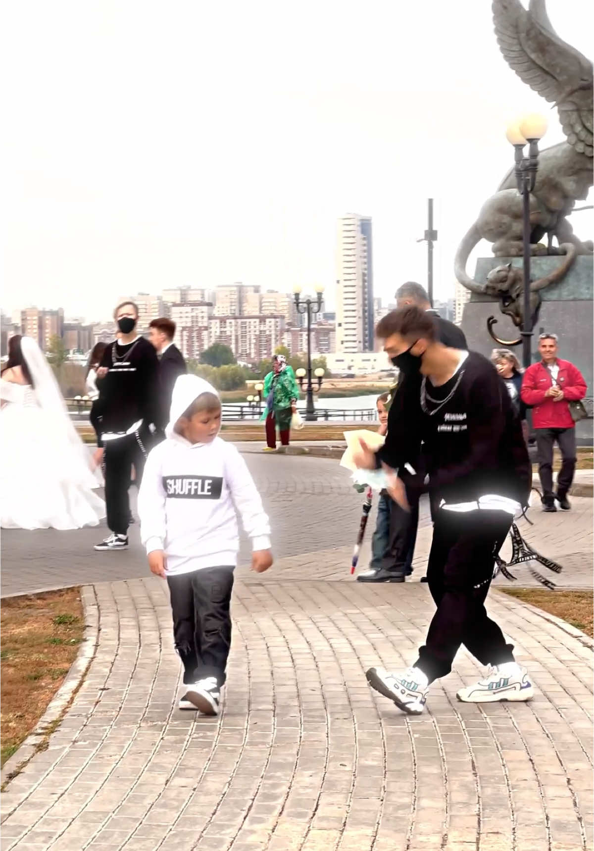 A post by @tuzelitydance on TikTok caption: TUZELITY TEACHING SHUFFLE 😨 LITTLE BOY 👦 Dancing!! 😎🔥