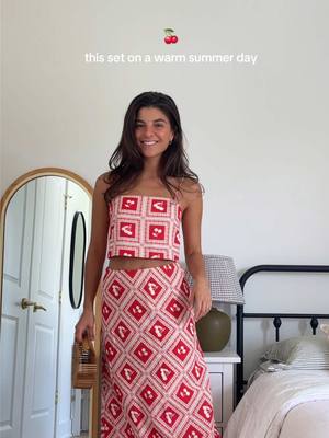 A post by @vivianeaudi on TikTok caption: loving red + anything cherries is too cute. could be so cute paired with a solid tank or tee too ✨ #summeroutfit #summeroutfits #summeroutfitinspo #reddress #matchingsets #abercrombiehaul #abercrombie #summerhaul #tryonhaul 