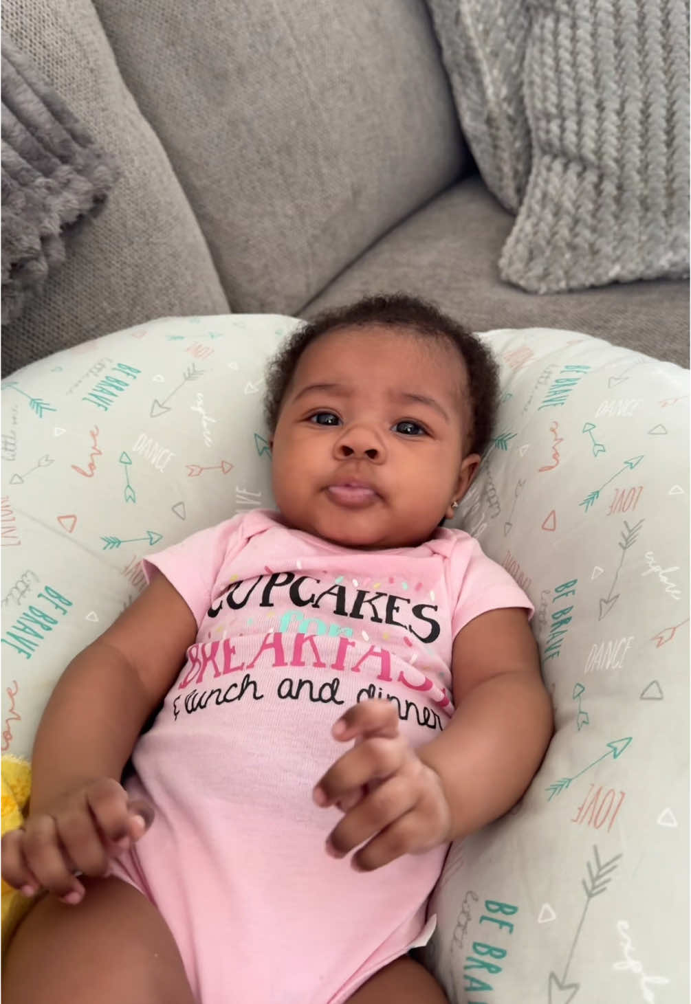 A post by @ on TikTok caption: she be wanting all the attention then when yu not paying attention she fake cry 😭😭😭🥰#chicago #firsttimemom #gerberbaby 