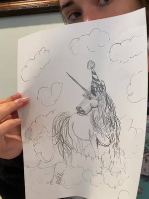 A post by @sarahsoda5 on TikTok caption: One of my famous unicorn art pieces graphite x dollar tree copy paper #suedillonunicorn #unicornart #Art  