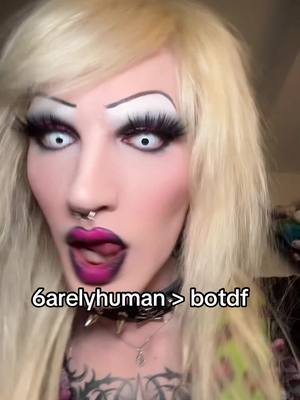 A post by @6arelyhuman on TikTok caption: all shade 💋 #6arelyhuman #scenequeen 