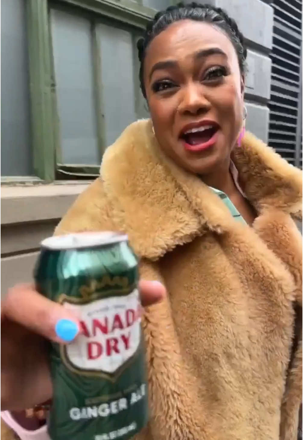 A post by @tatyanaalitv on TikTok caption: You can't see it in the video, but it WAS actually raining..... hence, SWV, duh 😭  #516Forever #iloveyounewyork! 