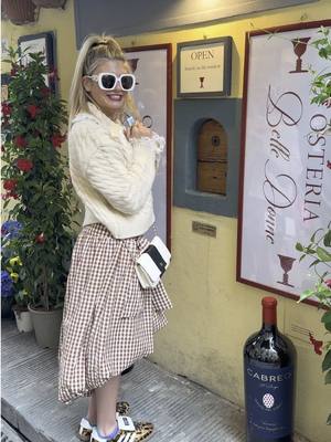 A post by @thesydneybelle on TikTok caption: The wine windows in Florence are absolutely magical🍷✨🇮🇹 #italy #fyp 