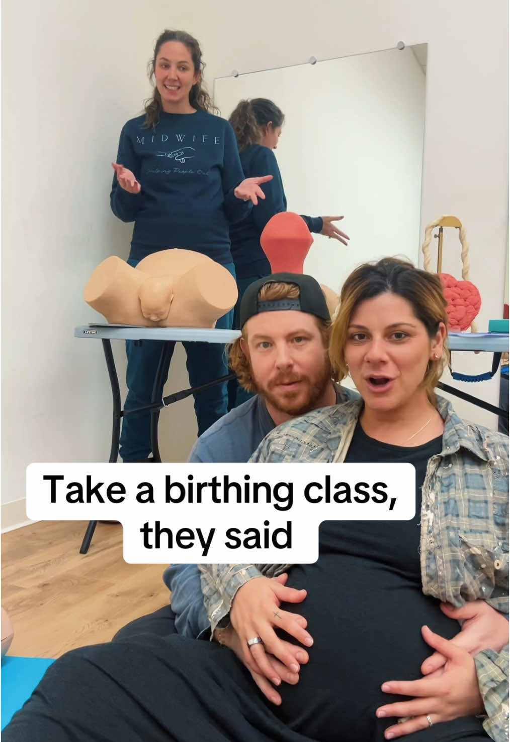 A post by @jaxwritessongs on TikTok caption: It’ll be fun, they said.                                 👶🏼😩😳                                         @Husband of a TikToker @Lila Maternity @Caitlyn | Modern Midwife #pregnancy #doechii #fyp #mother #class 