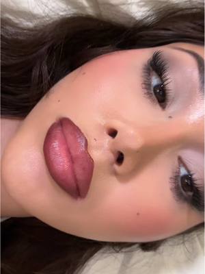 A post by @nazliayunus on TikTok caption: easy Smokey eye and cherry red lip 🍒🍒🍒🥤❤️ #eyeshadowlook #eyemakeup #eyeshadow #cherryredlipstick #redlips #cherrylips #eyeshadowlook #makeuplook #makeupinspo #smokeyeyelook #smokeyeye 