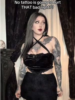 A post by @ravengriim on TikTok caption: It really was that bad😂 So worth it though!! #fullbacktattoo #backtattoo #heavilytattooed #tattootok #tattooedgirls #animetattoo #horrortattoo 