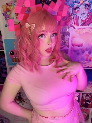 A post by @enyaarwyen on TikTok caption: From one pink cosplay to another … pink cosplay #cosplay #cosplayer #fyp #sabrinacarpenter #transition #foryoupage 