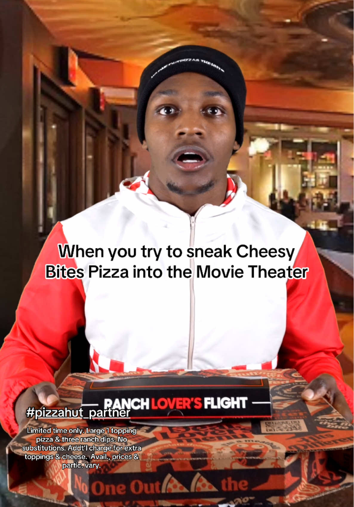A post by @ on TikTok caption: When you try to sneak Cheesy Bites Pizza into the Movie Theater ! #pizzahut_partner 