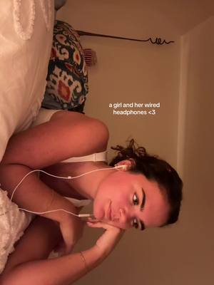 A post by @meggghughes on TikTok caption: emotional support earphones <3