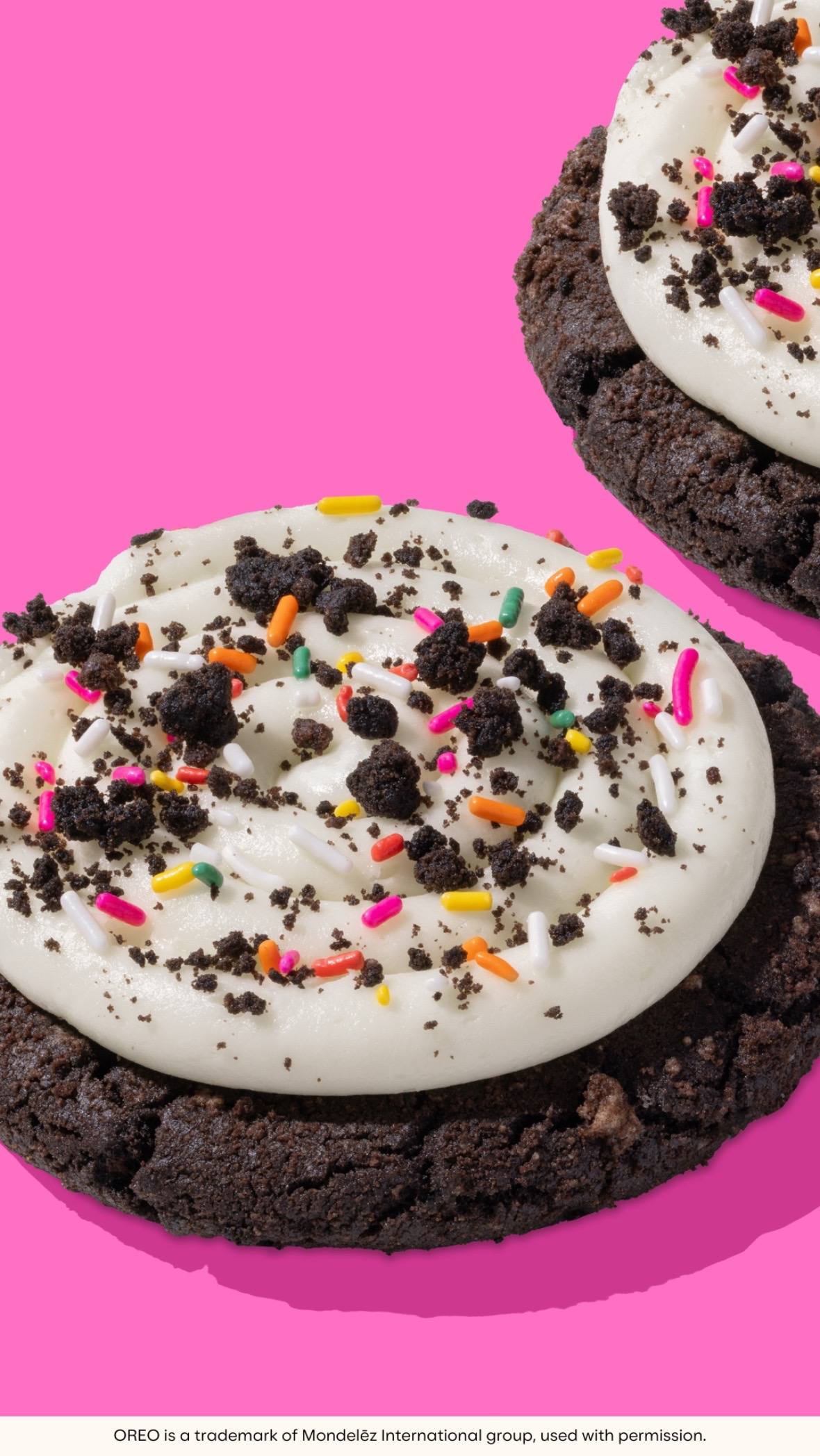 A post by @crumbl on TikTok caption: It may not be your birthday, but it might as well be. 🤩🎁 A thick cookie made with OREO® cookie pieces, covered in cake batter cream cheese frosting and topped with more OREO® cookie pieces and rainbow sprinkles. Who's excited to dig in? 👀 #Crumbl