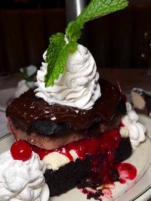 A post by @briotchhh on TikTok caption: I love when I walk into a restaurant and feel like family ❤️  Only at Tony Di Napoli can you find Italian food this good, this big, and served like you're at a family reunion. This place is all about family-style portions and when I say Italian-sized I mean one plate feeds, like, four people. Maybe five… if you’re being polite. The dessert menu is insane so please don’t skip dessert. Every dish is classic and done right!! 📍Tony Di Napoli  Time Square: 147 W 43rd St Time Square, New York City UES: 1081 Third Ave New York, New York City  🍝 Stuffed Mushrooms  🍝 Grilled Octopus  🍝 Caesar Salad Table Side 🍝 Mussels 🍝 Shrimp Parmigiana  🍝 Rigatoni Bolgnwse  🍝 Penne Al vodka 🍝 Cherry Pepper Chicken    Check them out! #nycdinner#nyc#nyctok #foodontiktok#nycdessert#foodreview#manhattan#nyceats#nycrestaurants#pasta#italian#nycdrinks