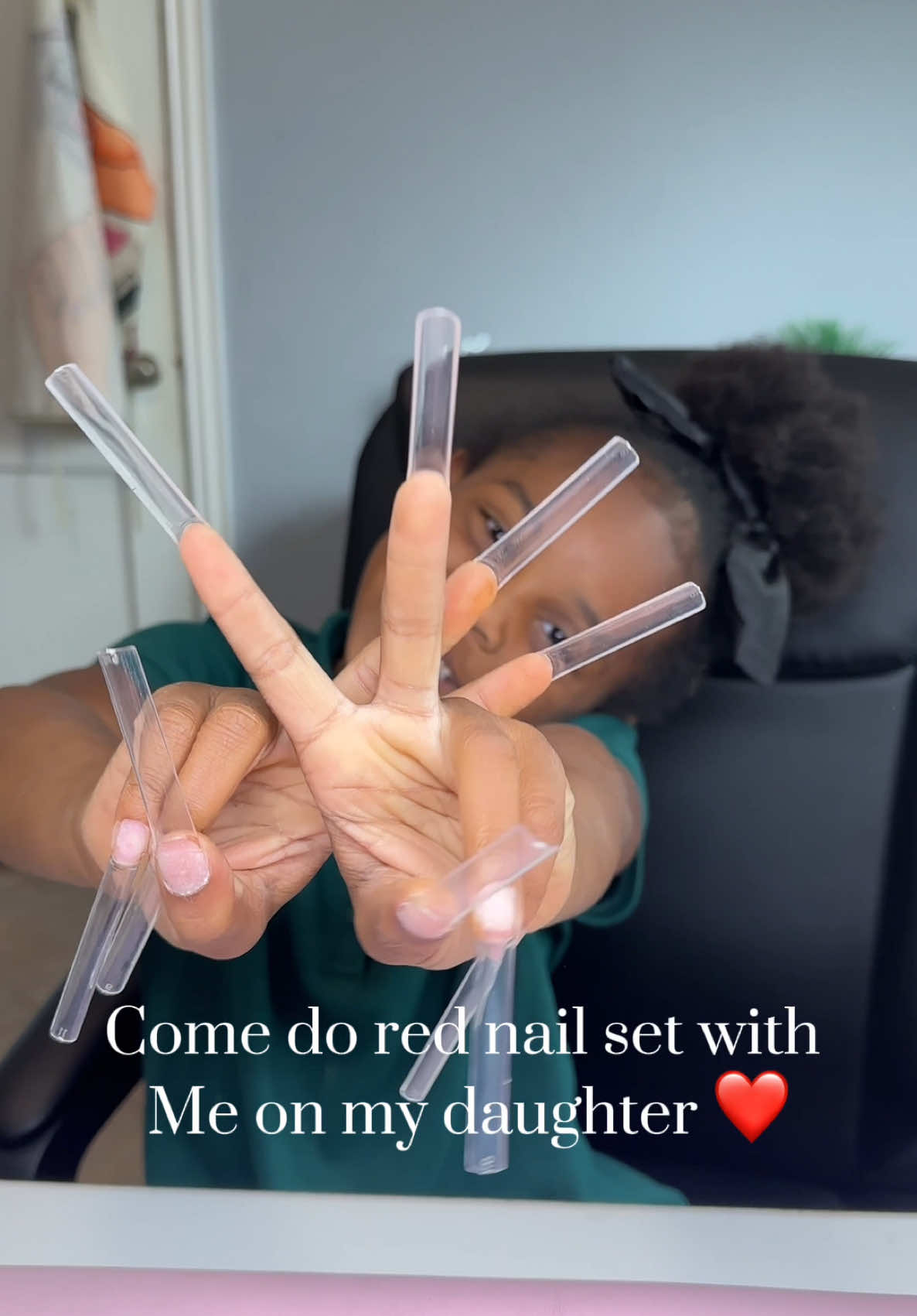 A post by @thanailldoll on TikTok caption: The nails are almost as beautiful as her ❤️ book your next appointment with me link in bio 😌 #nails #motherdaughter #viral #fypシ゚viral #squarenails #houstontxnailtech #tiktok #kidsoftiktok #acrylicnails #rednails #CapCut 