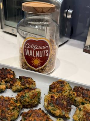 A post by @earthyjane on TikTok caption: California Walnut Falafel Wraps👩🏼‍🍳🧆✨ @CA Walnuts #CAWalnutsPartner #Sponsored 2 tbsp olive oil 1 onion, diced 3 cloves of garlic 1 can of chickpeas, drained and rinsed 1 tbsp ground flax 1 cup California walnuts 1/2 cup cilantro, chopped 1/2 cup parsley, chopped 3 tbsp flour (I used oat) 1 tsp salt 1 tsp pepper 1 tsp cumin 1/2 tsp onion powder 1/2 tsp garlic powder More olive oil for pan frying 1/2 cup marinated cherry tomatoes & cucumber  1/4 cup lemon tahini sauce 2-3 Wraps of choice  To get started, heat a large skillet on medium-high heat. Add in the oil, onion, and garlic. Saute for 5-6 minutes or until golden brown. Set that aside while you prepare the other ingredients. In a food processor or high-speed blender, add the chickpeas, ground flax, and California walnuts. Pulse until a dough forms. I like some texture but you can process until smooth if you prefer! Place the walnut mixture in a mixing bowl. Add the sauteed onion and garlic, chopped herbs, flour, and seasonings to the bowl and mix until evenly combined. The dough should hold together when pressed and molded. Make dough balls with your hands and set aside. You can prep these ahead of time and place in the fridge until you are ready to cook! Heat a large skillet on medium-high heat and add in the oil. Once the oil is hot, add the falafel balls into the oil with space between each one. Cook on medium for about 2-3 minutes each side or until golden brown. Once all are cooked, serve in the wrap and enjoy! 