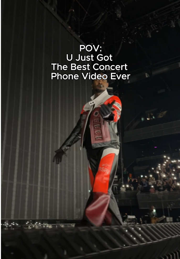 A post by @usher on TikTok caption: Felt the love and had to return it up close and personal 📱 #fyp #usher #concert #davidguetta #livesinging 