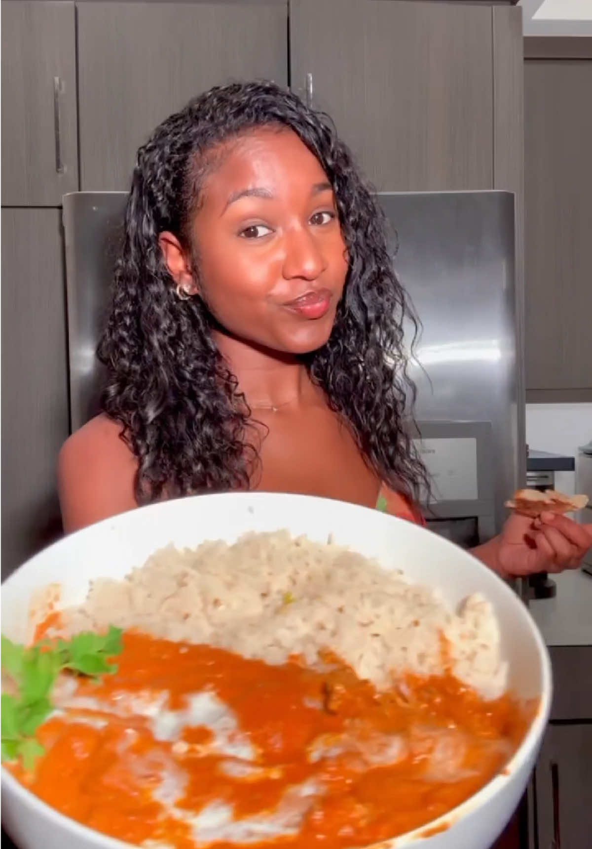 A post by @thecarlaciagrant on TikTok caption: Tried something a little different today 🥘 Thanks for the inspo! @The Rapping Chef 🎤👨🏾‍🍳 