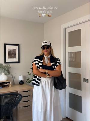 A post by @samanthaalfred on TikTok caption: How to dress for the female gaze 👜🤍✨👢#howtodress #femalegaze #howtostyle #ootd #outfitideas #fashiontiktok #styleinspo #midsizefashion #midsizetiktok #midsizeoutfits 