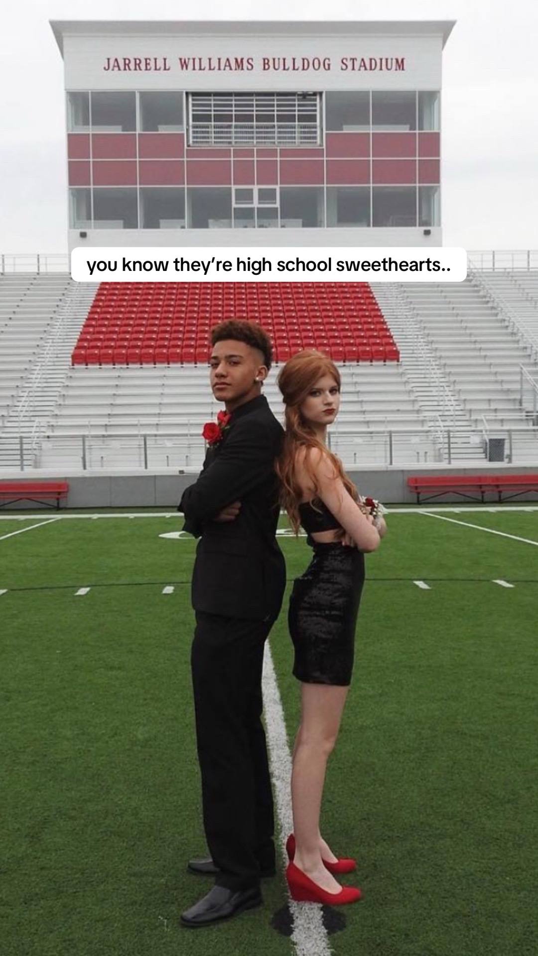 A post by @channingjanae on TikTok caption: wish we could go back and tell those kids that their dream really will come true 🤍 #highschoolsweethearts #husbandwife #marriage #trend #trending #couple #jayandchan #arkansas #love 
