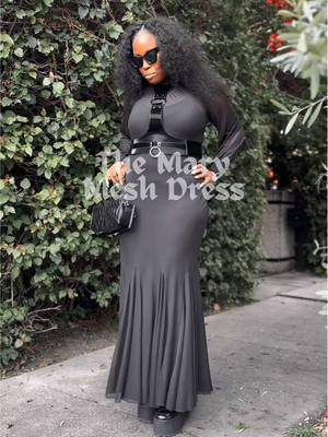 A post by @foxbloodshop on TikTok caption: Thee perfect completely sheer mesh maxi dress of your goth dreams 🖤 #whatiwore #gothtok #darkaesthetic #gothfashion #gothicstyle #darkromance 