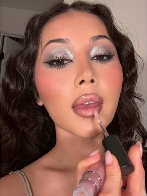 A post by @nazliayunus on TikTok caption: this is officially my fave look 🩶⛓️⛓️⛓️ full face of @maccosmetics #silvereyeshadow #eyeshadowlook #makeuplook #darkfemininemakeup #fullglam #cooltonedmakeup 