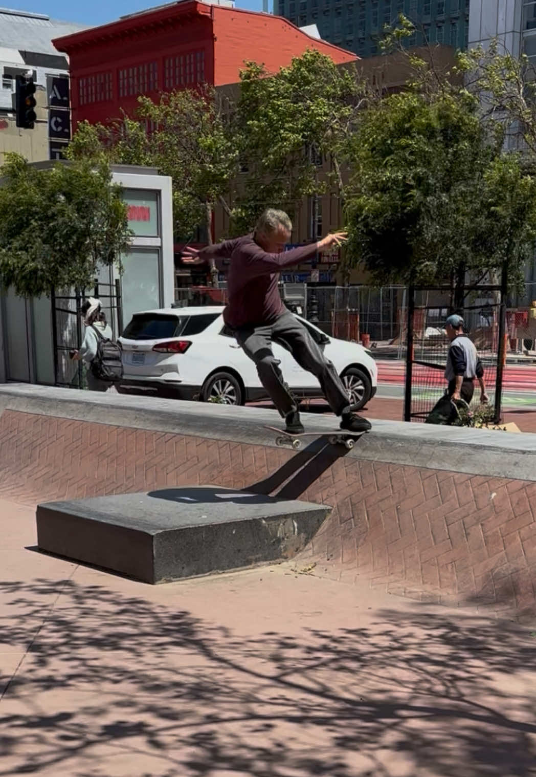 A post by @tonyhawk on TikTok caption: The UN Skate Plaza recently got an upgrade! If you build it, I will come… do vert tricks (and sloppy kickflips) on the banks. Fun fact: SF - and this song - will be in the new @THPS. 👴🏼🎮🛹