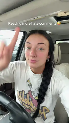 A post by @thefarmergrayce on TikTok caption: Reading hate comments 😂