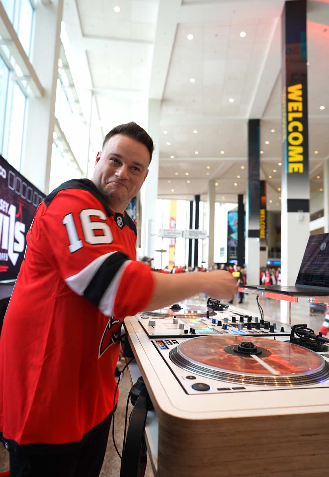 A post by @djnickspinelli on TikTok caption: Live mashups at the @New Jersey Devils game 😃