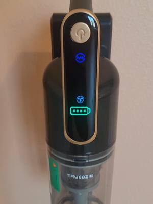 A post by @therealveronika_ on TikTok caption: I didn't even have to dump a bunch coffee grounds on the floor to prove how well this vacuum works. My dog's hair has clogged every vacuum I've ever owned, except this one! #fyp #trucozie #cordlessvacuum 