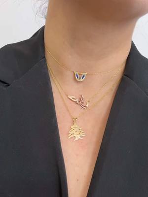 A post by @berkachi on TikTok caption: The iconic Donna 3-layer necklace is calling your name—literally! Personalize it, rock 18K gold, and get FREE shipping anywhere in the USA. Claim yours now and don’t forget to say “Donna” for that exclusive discount. Limited time only